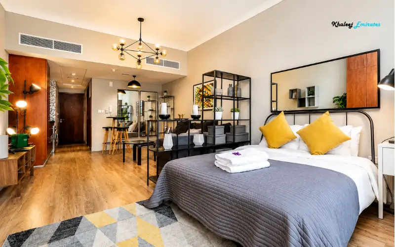 Studio Apartment Interior with Modern Bedroom and Living Space in Lake Terrace Tower Dubai