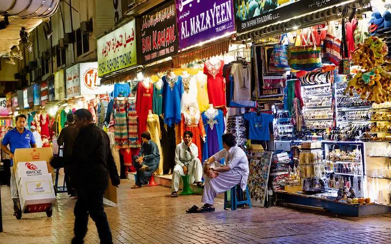 Naif Market Dubai with traditional shops, colorful clothing and local shopping stalls